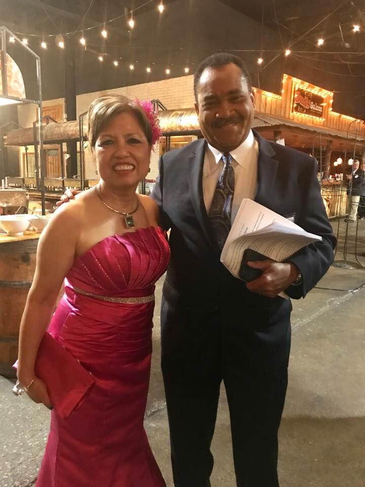 With TV anchor man John McKay