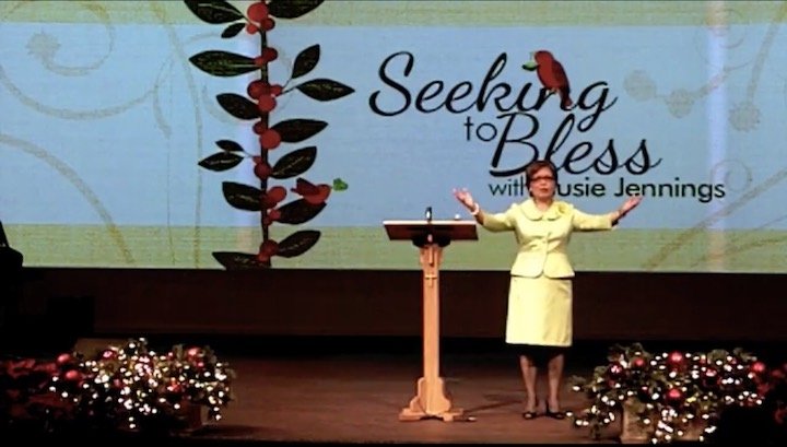 Susie speaking at a Seeking to Bless event